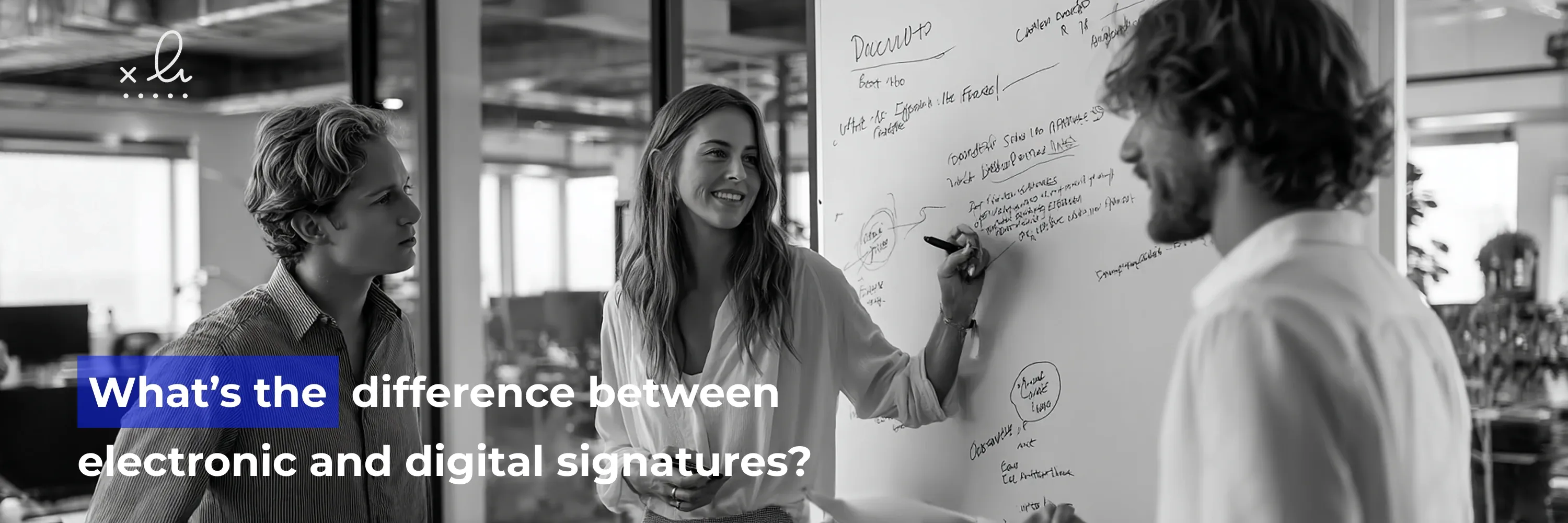 A business team collaborates at a whiteboard while discussing the difference between electronic and digital signatures, highlighting use cases, security, and compliance in modern workflows