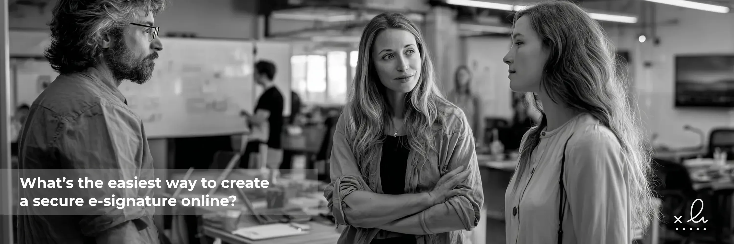 A professional team discusses how to create a secure e-signature online in a modern office setting, illustrating collaboration around digital document signing solutions